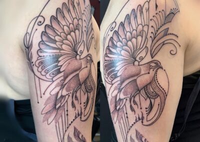 Bird in Flight Arm Tattoo