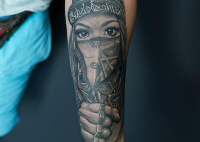 Face of Defiance Tattoo